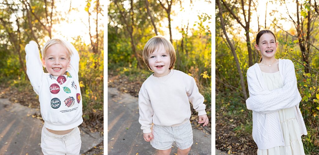 Three children posing individually on a forest path with golden sunlight filtering through fall trees.
